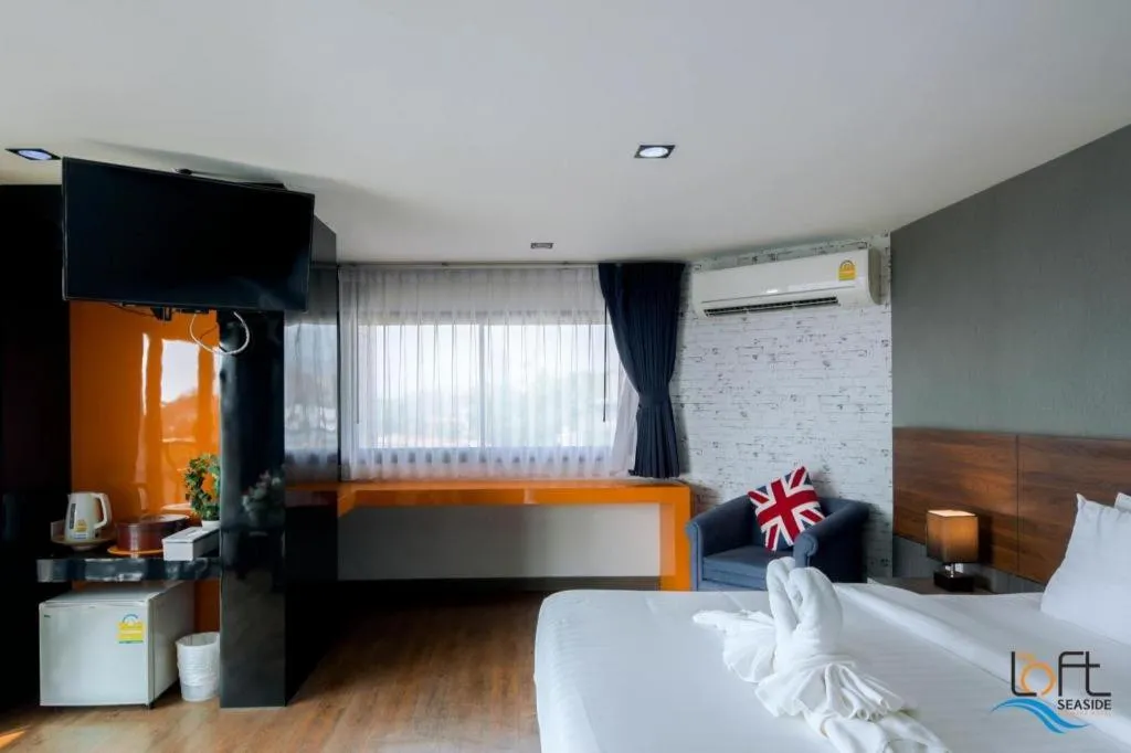 Bed in The Loft Seaside Sriracha Hotel