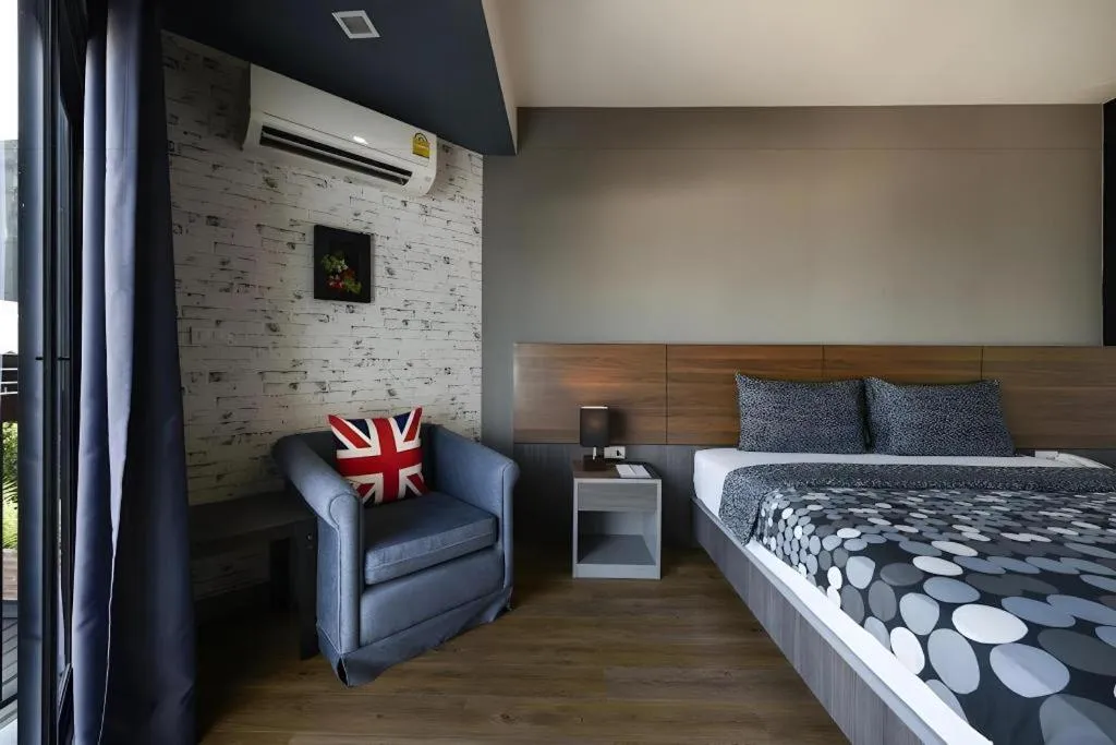 Bed in The Loft Seaside Sriracha Hotel