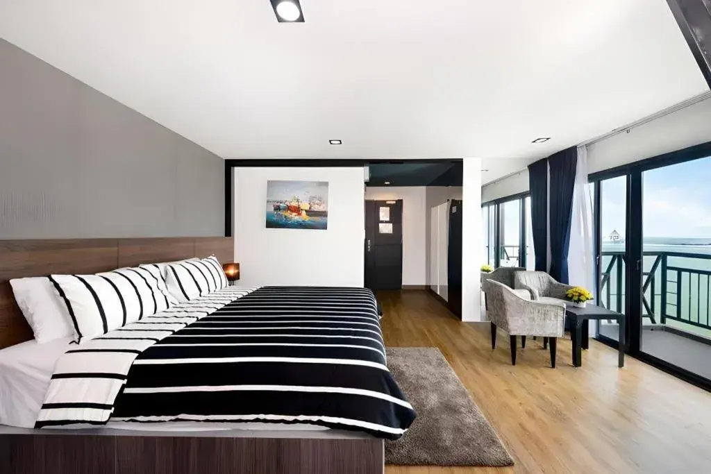 Bed in The Loft Seaside Sriracha Hotel Bed in The Loft Seaside Sriracha Hotel