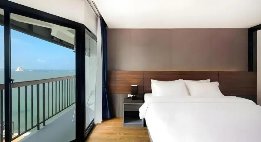 Bed in The Loft Seaside Sriracha Hotel Bed in The Loft Seaside Sriracha Hotel