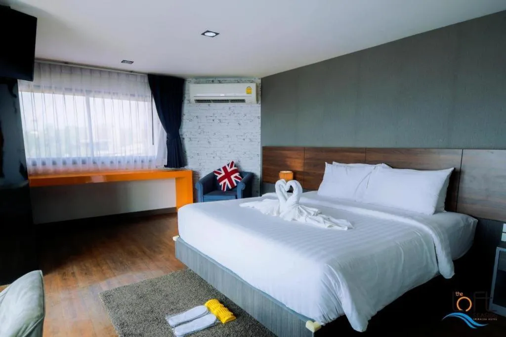 Bed in The Loft Seaside Sriracha Hotel