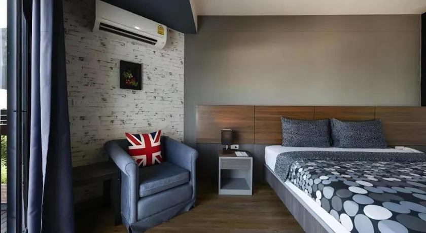 Bed in The Loft Seaside Sriracha Hotel