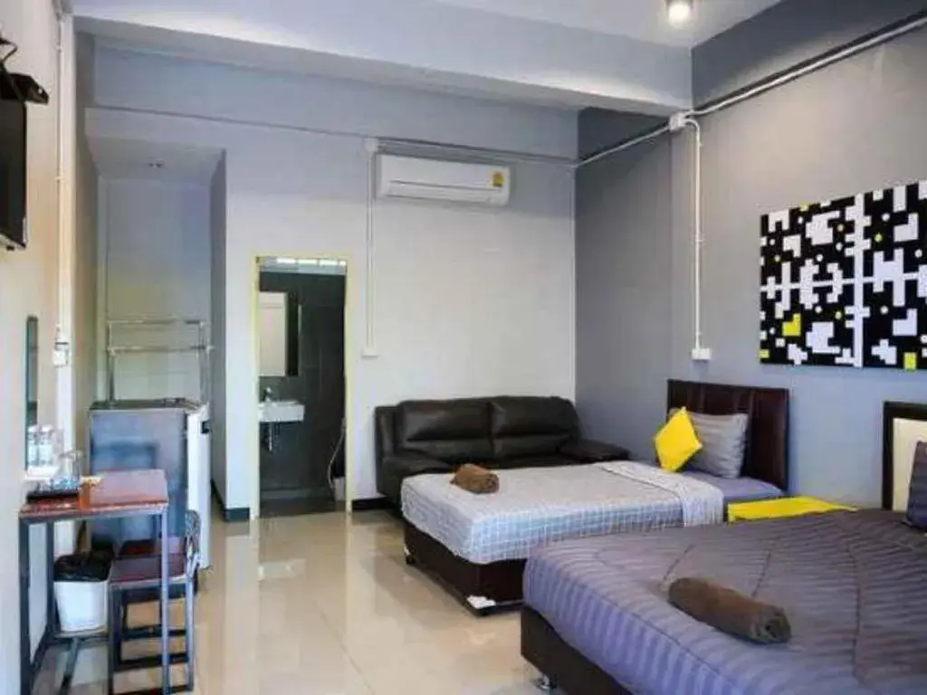 Bed in Nithra Ratree Hotel Bed in Nithra Ratree Hotel