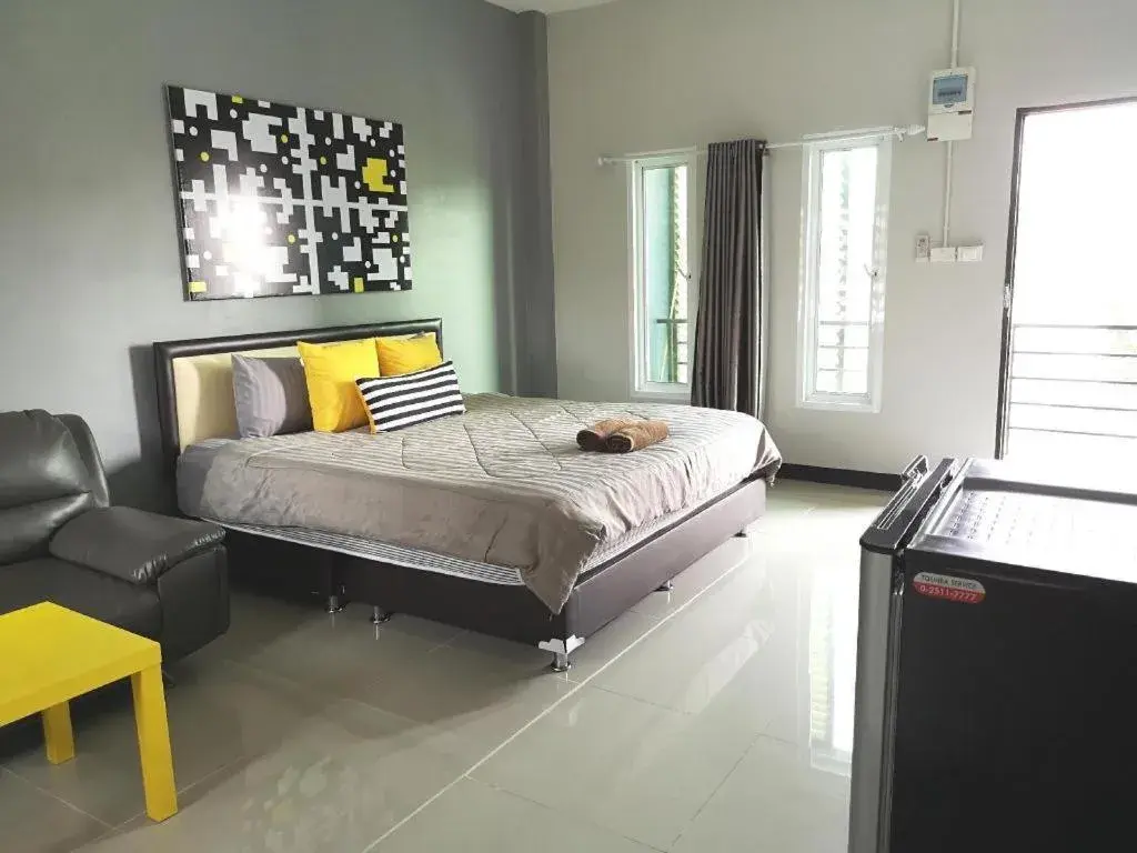 Bed in Nithra Ratree Hotel Bed in Nithra Ratree Hotel