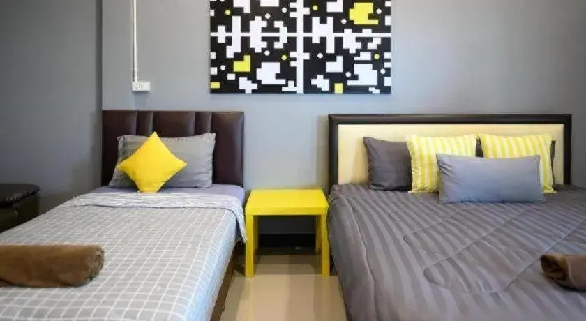 Bed in Nithra Ratree Hotel Bed in Nithra Ratree Hotel