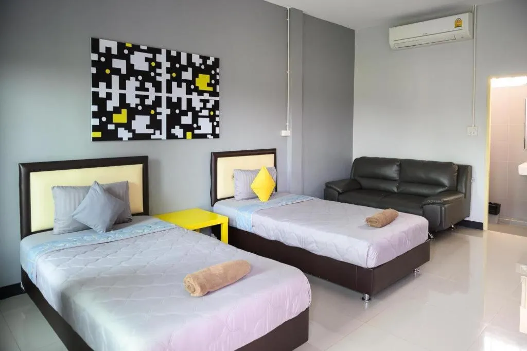 Bed in Nithra Ratree Hotel