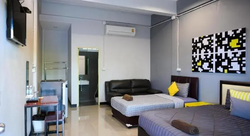 Bed in Nithra Ratree Hotel Bed in Nithra Ratree Hotel