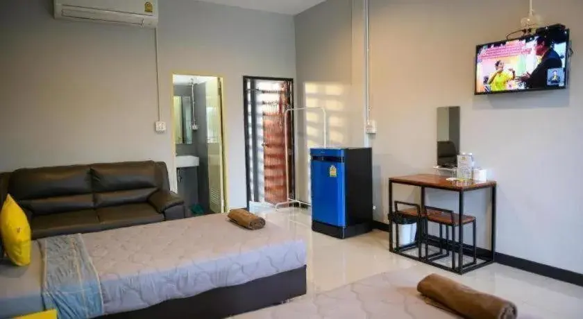 Bed in Nithra Ratree Hotel Bed in Nithra Ratree Hotel