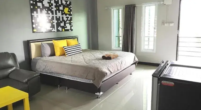 Bed in Nithra Ratree Hotel Bed in Nithra Ratree Hotel