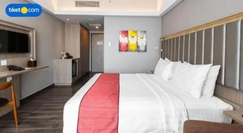 Bed in Gammara Hotel Makassar