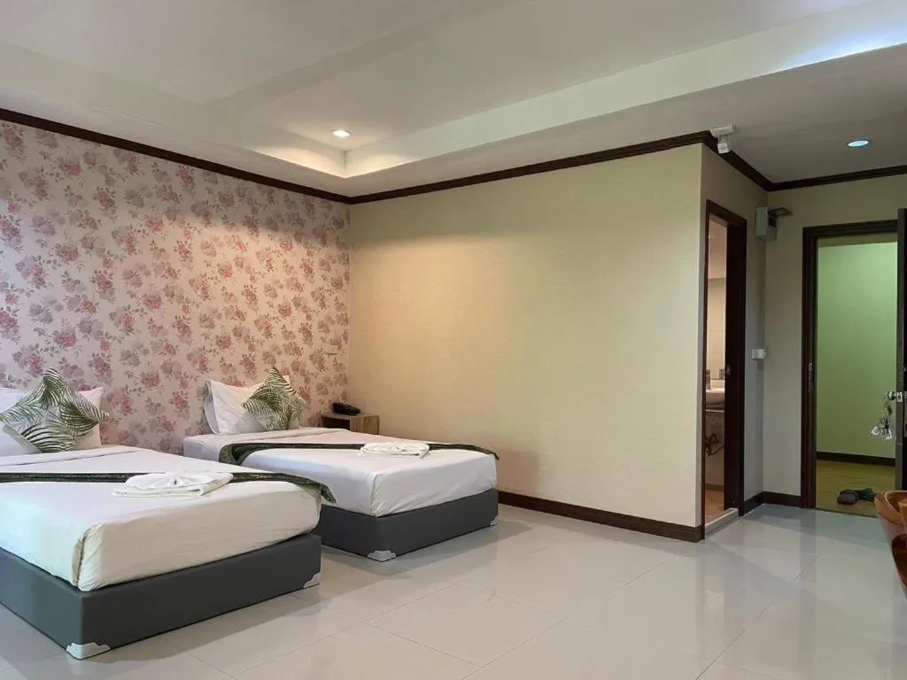 Bed in Khaoyai Kirithantip Resort