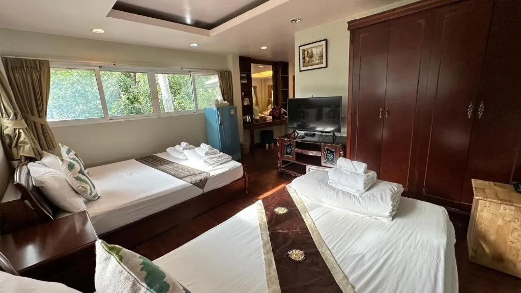 Bed in Khaoyai Kirithantip Resort