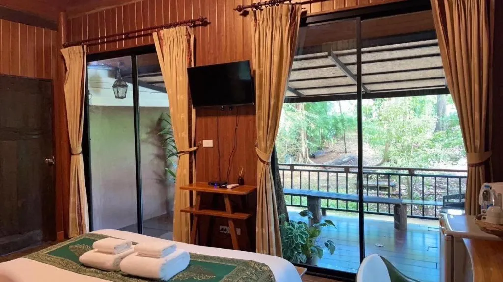 Bed in Khaoyai Kirithantip Resort