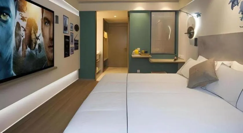 Bed in Magnotel Hotel Shanghai Jinjiang Park Branch