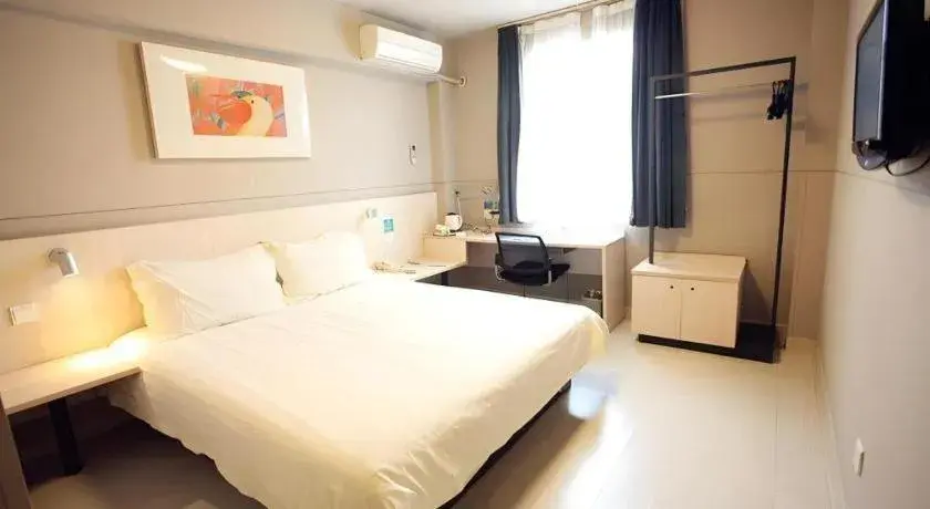 Bed in Jinjiang Inn Yueyang Railway Station Bed in Jinjiang Inn Yueyang Railway Station