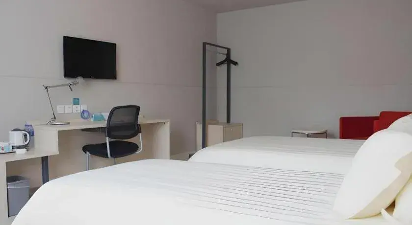 Bed in Jinjiang Inn Yueyang Railway Station Bed in Jinjiang Inn Yueyang Railway Station