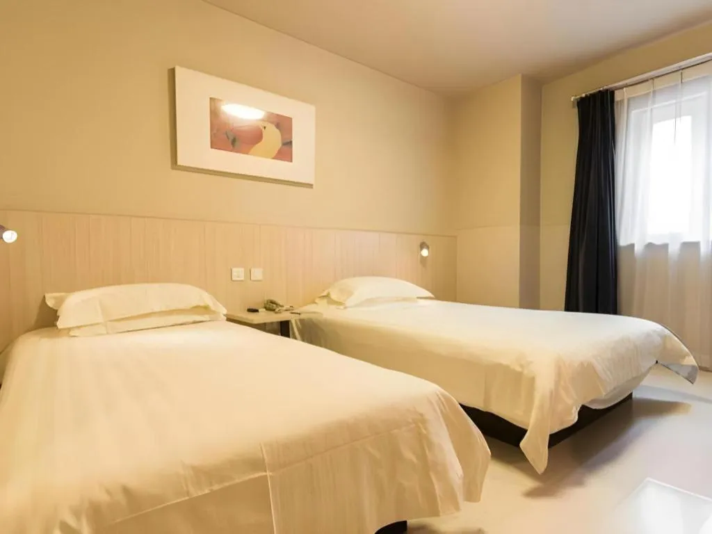 Bed in Jinjiang Inn Beijing Capital International Airport New Expo Metro Station