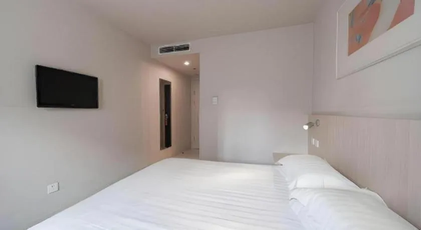 Bed in Jinjiang Inn Beijing Capital International Airport New Expo Metro Station