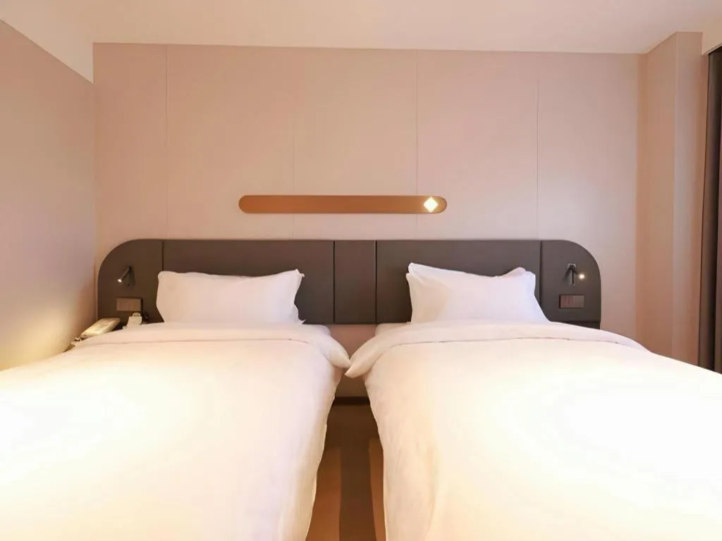 Bed in Jinjiang Inn Beijing Capital International Airport New Expo Metro Station