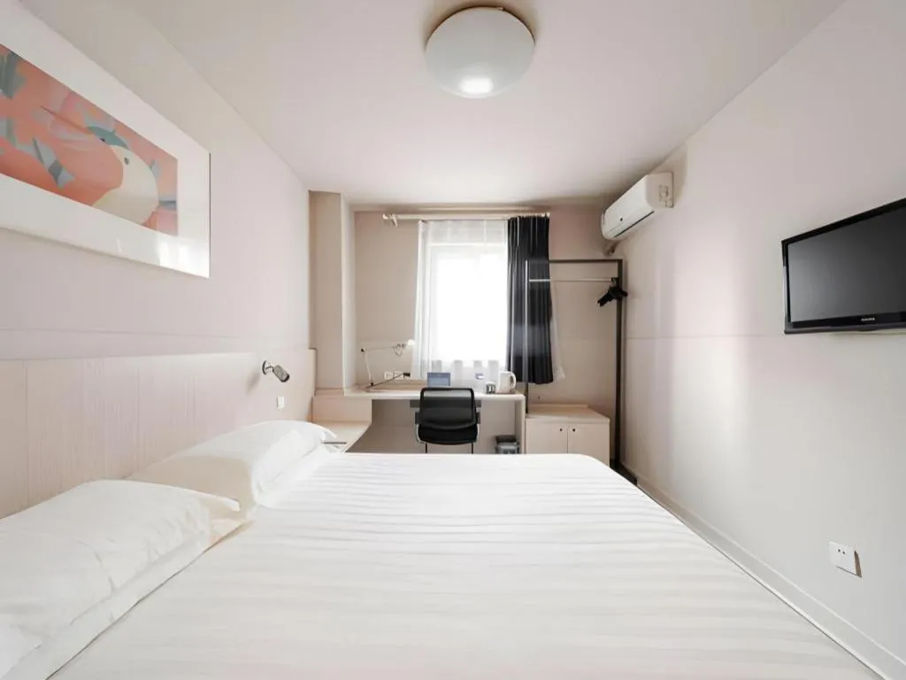Bed in Jinjiang Inn Beijing Capital International Airport New Expo Metro Station
