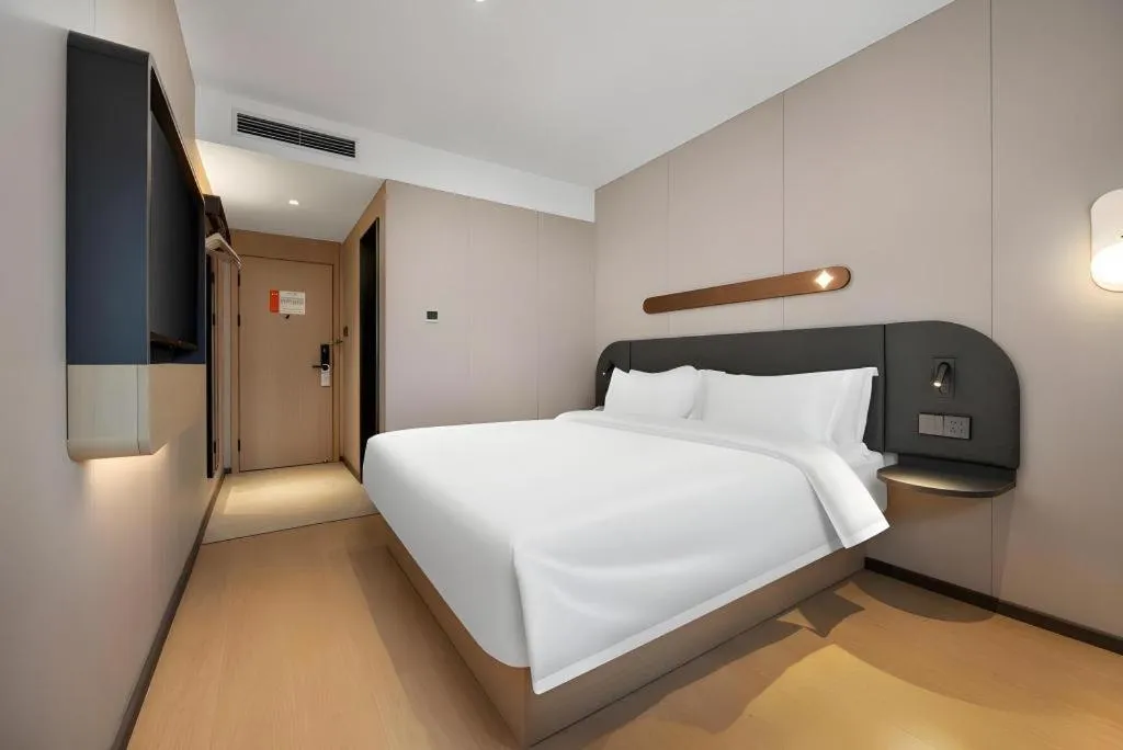 Bed in Jinjiang Inn Beijing Capital International Airport New Expo Metro Station