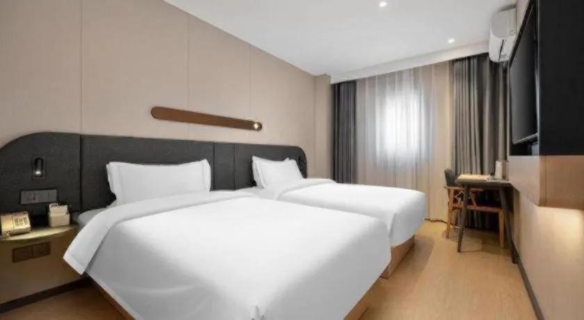 Bed in Jinjiang Inn Beijing Capital International Airport New Expo Metro Station