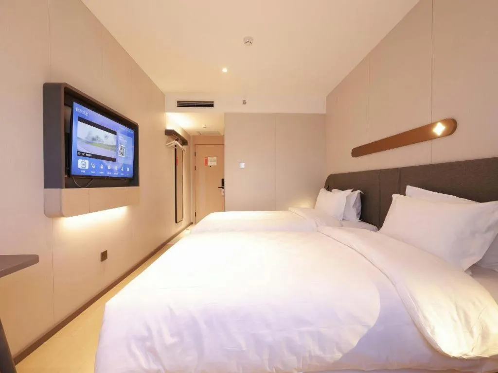 Bed in Jinjiang Inn Beijing Capital International Airport New Expo Metro Station