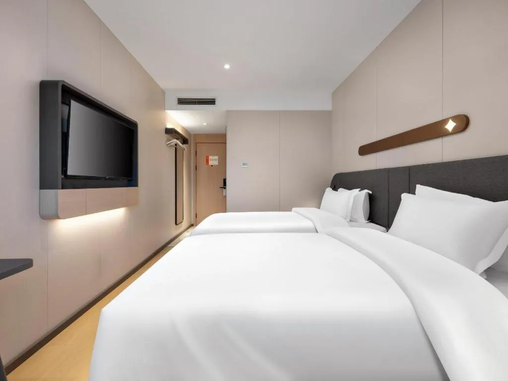 Bed in Jinjiang Inn Beijing Capital International Airport New Expo Metro Station