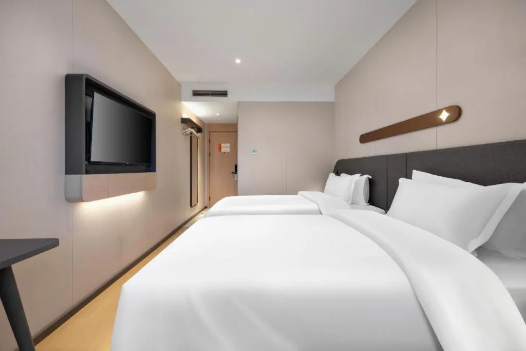 Bed in Jinjiang Inn Beijing Capital International Airport New Expo Metro Station