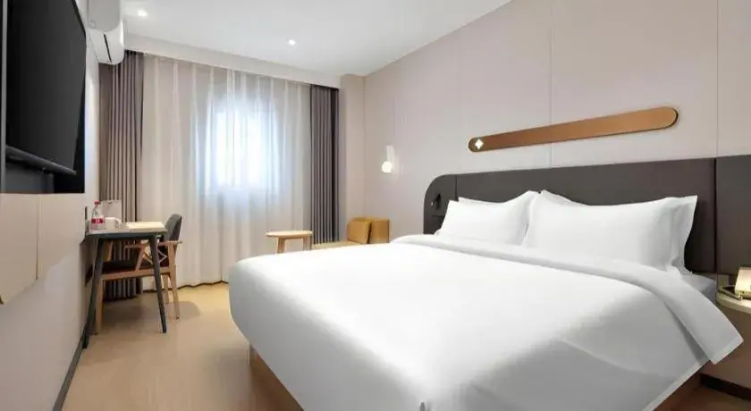 Bed in Jinjiang Inn Beijing Capital International Airport New Expo Metro Station Bed in Jinjiang Inn Beijing Capital International Airport New Expo Metro Station