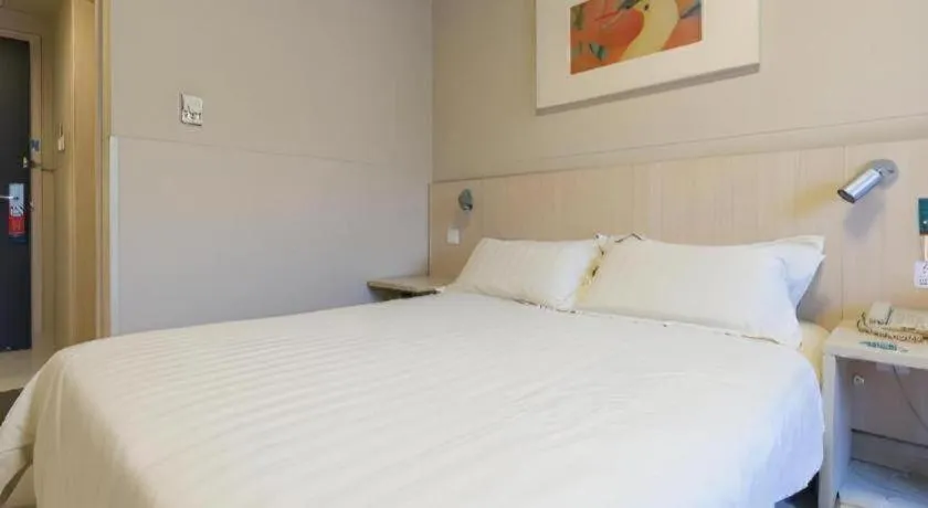 Bed in Jinjiang Inn Beijing Capital International Airport New Expo Metro Station