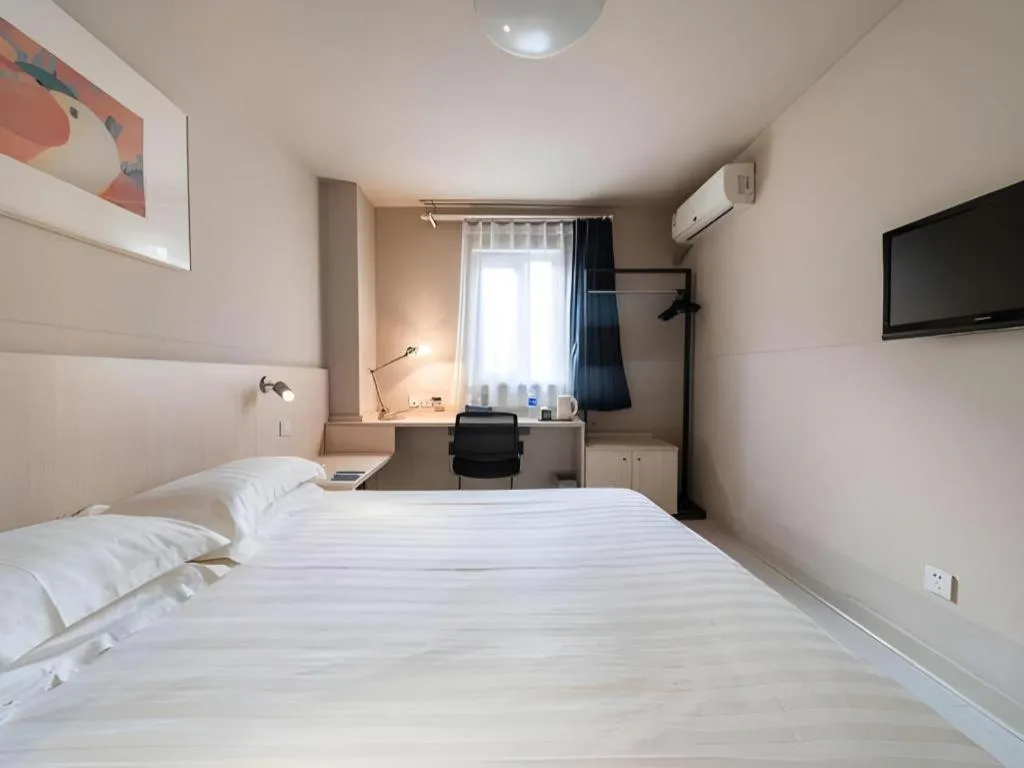 Bed in Jinjiang Inn Beijing Capital International Airport New Expo Metro Station