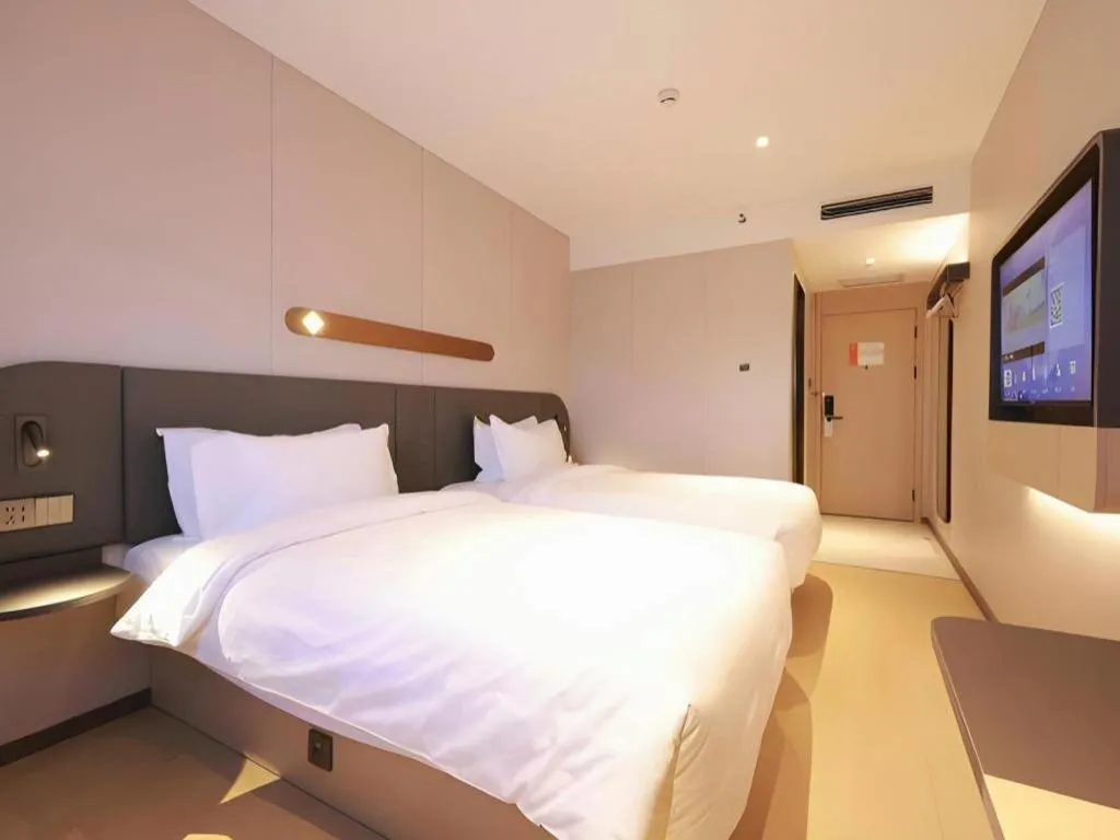 Bed in Jinjiang Inn Beijing Capital International Airport New Expo Metro Station