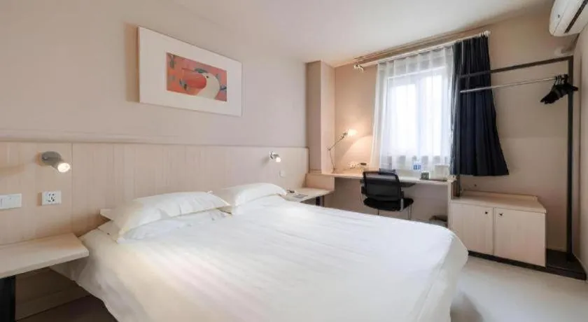 Bed in Jinjiang Inn Beijing Capital International Airport New Expo Metro Station