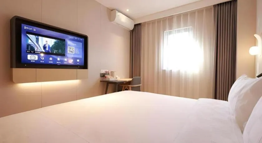 Bed in Jinjiang Inn Beijing Capital International Airport New Expo Metro Station