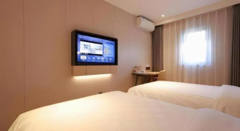 Bed in Jinjiang Inn Beijing Capital International Airport New Expo Metro Station