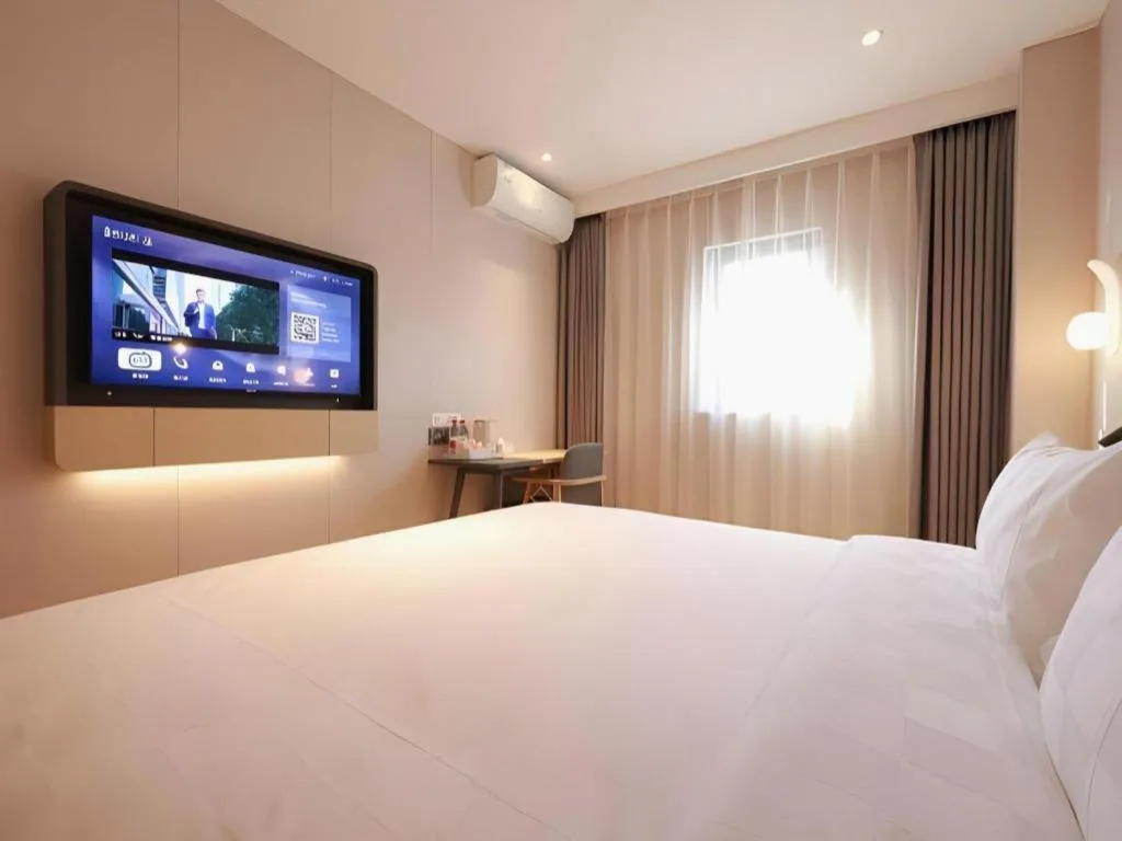 Bed in Jinjiang Inn Beijing Capital International Airport New Expo Metro Station