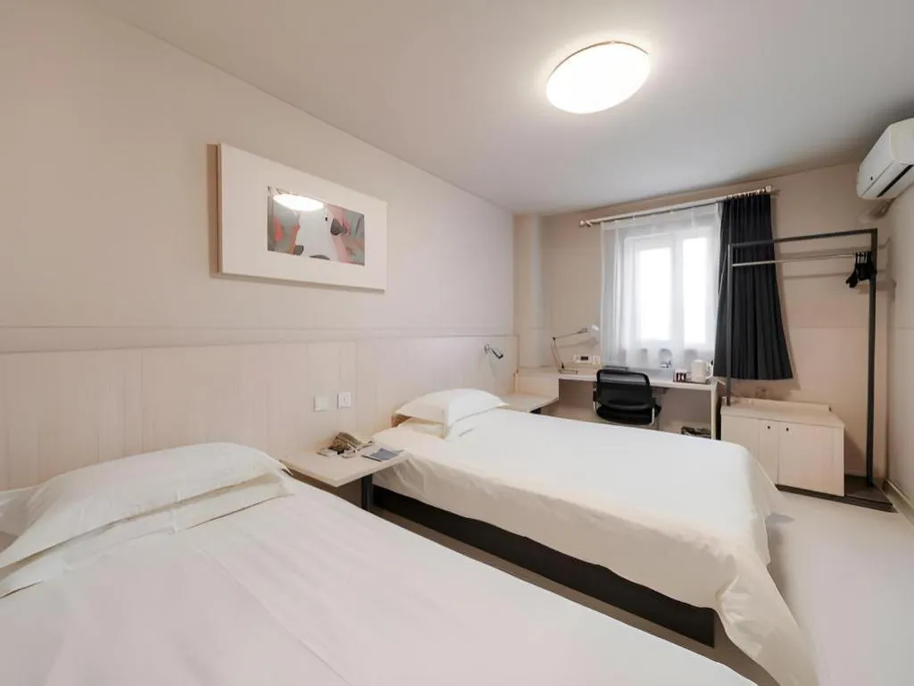 Bed in Jinjiang Inn Beijing Capital International Airport New Expo Metro Station