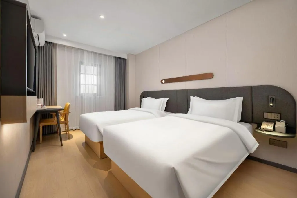 Bed in Jinjiang Inn Beijing Capital International Airport New Expo Metro Station