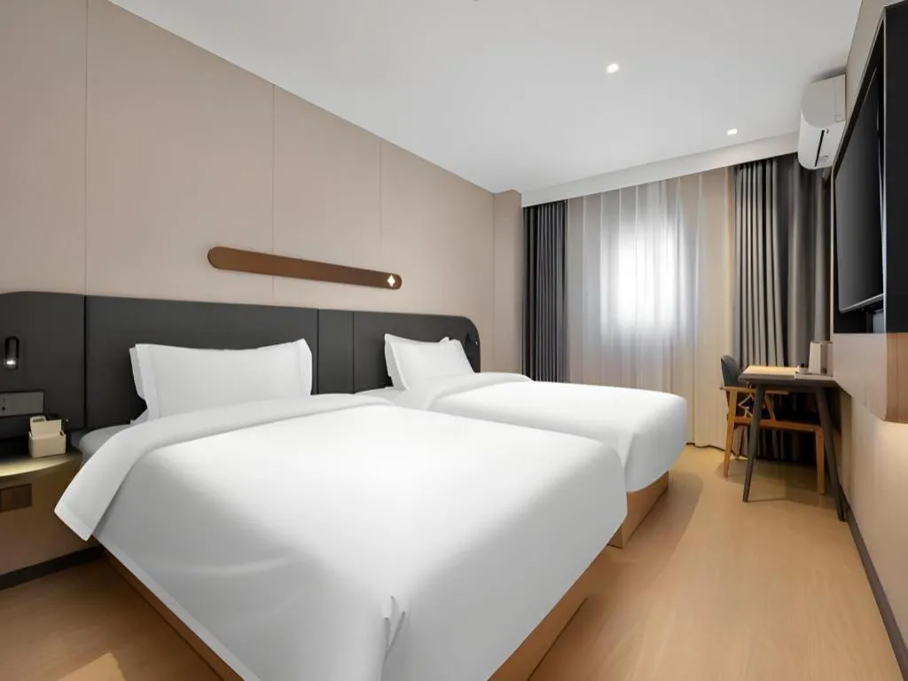 Bed in Jinjiang Inn Beijing Capital International Airport New Expo Metro Station