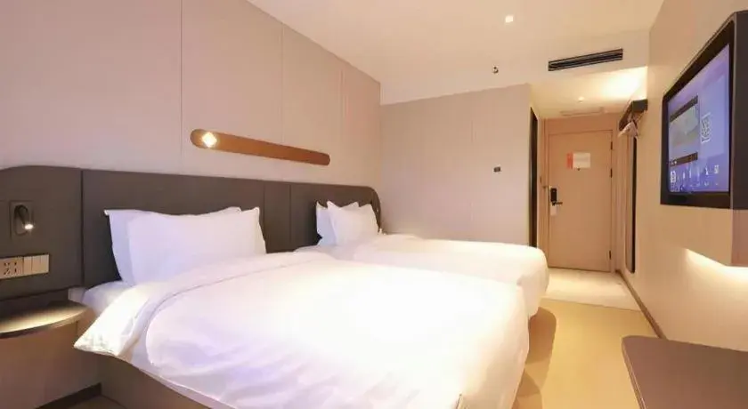 Bed in Jinjiang Inn Beijing Capital International Airport New Expo Metro Station Bed in Jinjiang Inn Beijing Capital International Airport New Expo Metro Station