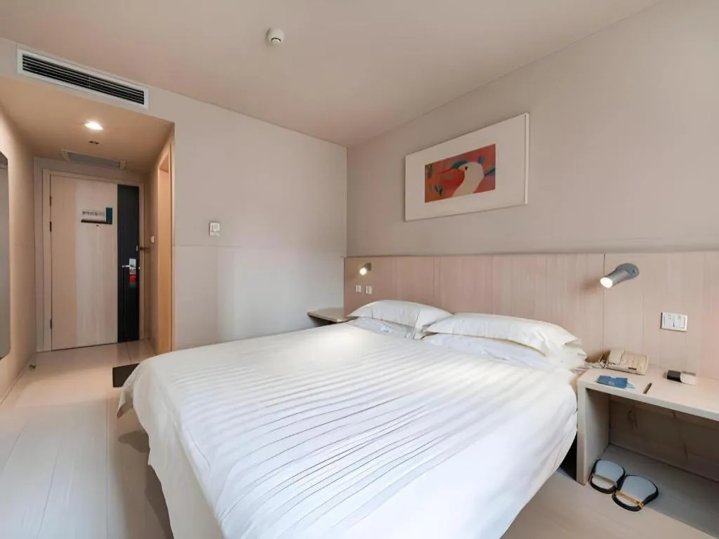 Bed in Jinjiang Inn Beijing Capital International Airport New Expo Metro Station