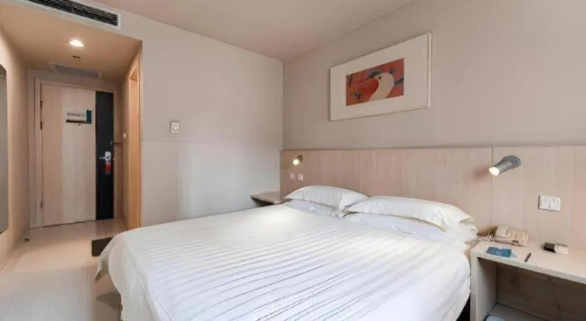 Bed in Jinjiang Inn Beijing Capital International Airport New Expo Metro Station