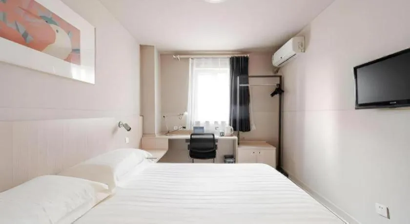 Bed in Jinjiang Inn Beijing Capital International Airport New Expo Metro Station