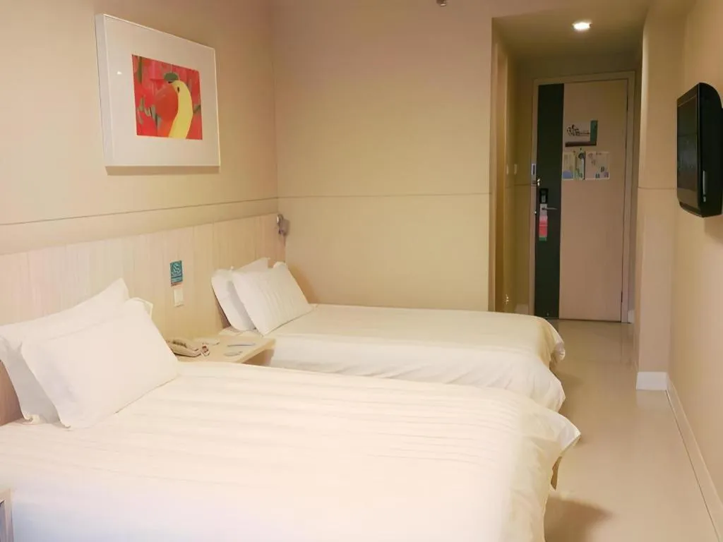 Bed in Jinjiang Inn Beijing Capital International Airport New Expo Metro Station