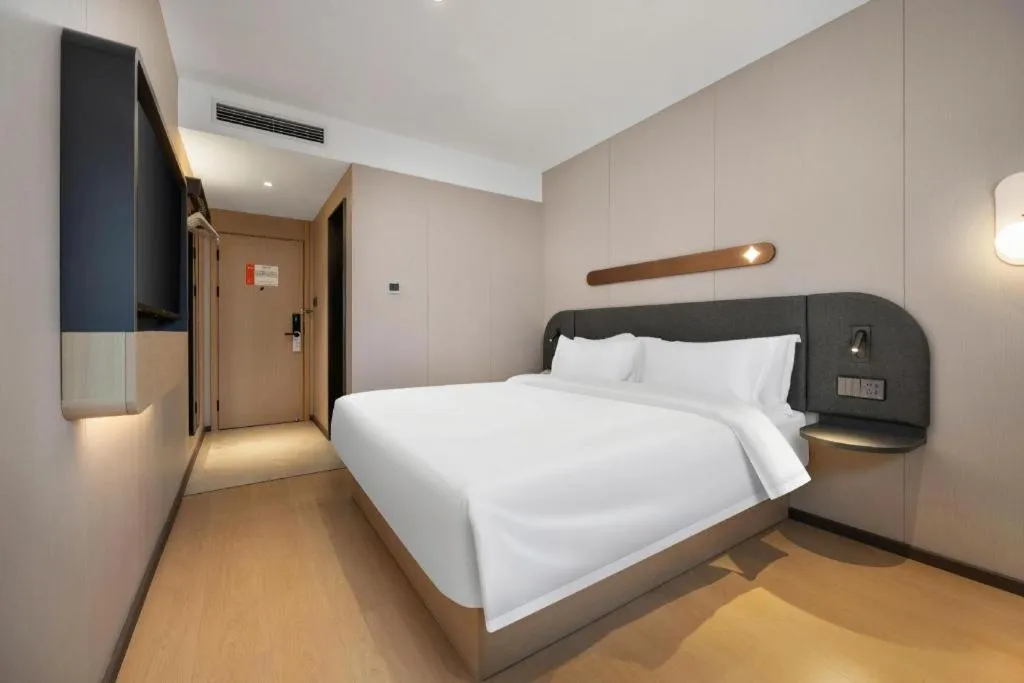 Bed in Jinjiang Inn Beijing Capital International Airport New Expo Metro Station