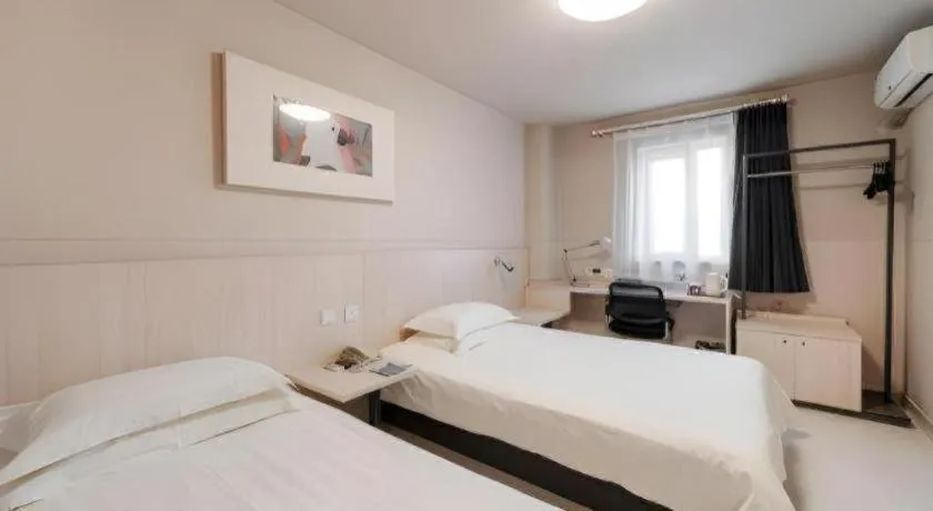Bed in Jinjiang Inn Beijing Capital International Airport New Expo Metro Station