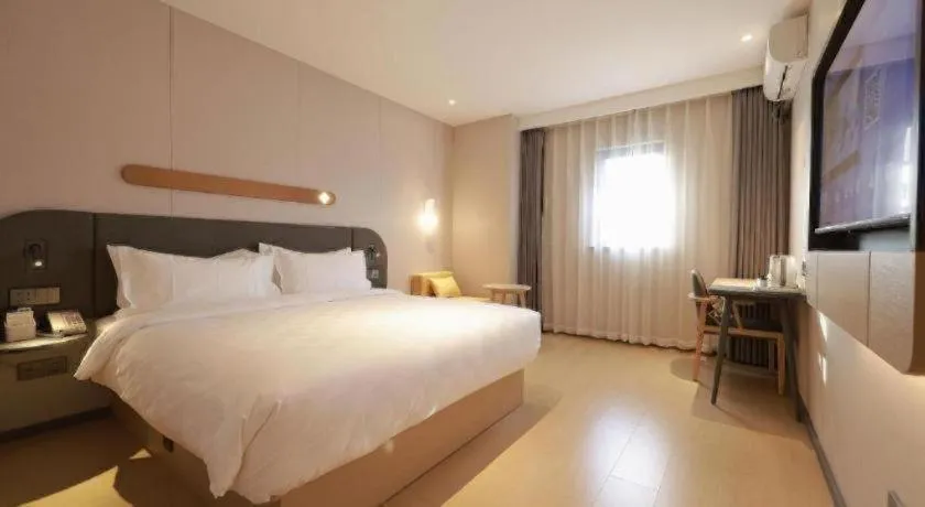 Bed in Jinjiang Inn Beijing Capital International Airport New Expo Metro Station