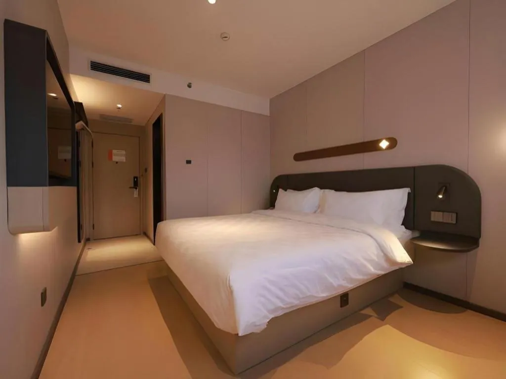 Bed in Jinjiang Inn Beijing Capital International Airport New Expo Metro Station