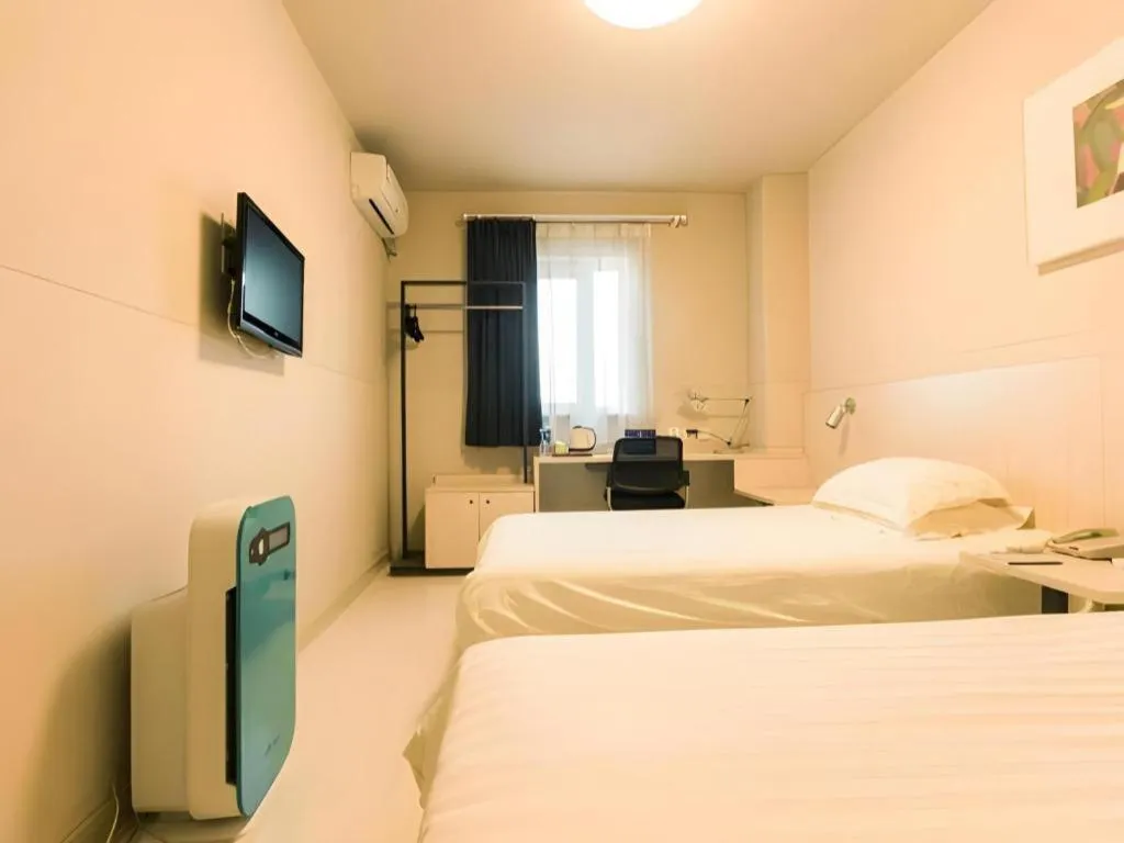 Bed in Jinjiang Inn Beijing Capital International Airport New Expo Metro Station